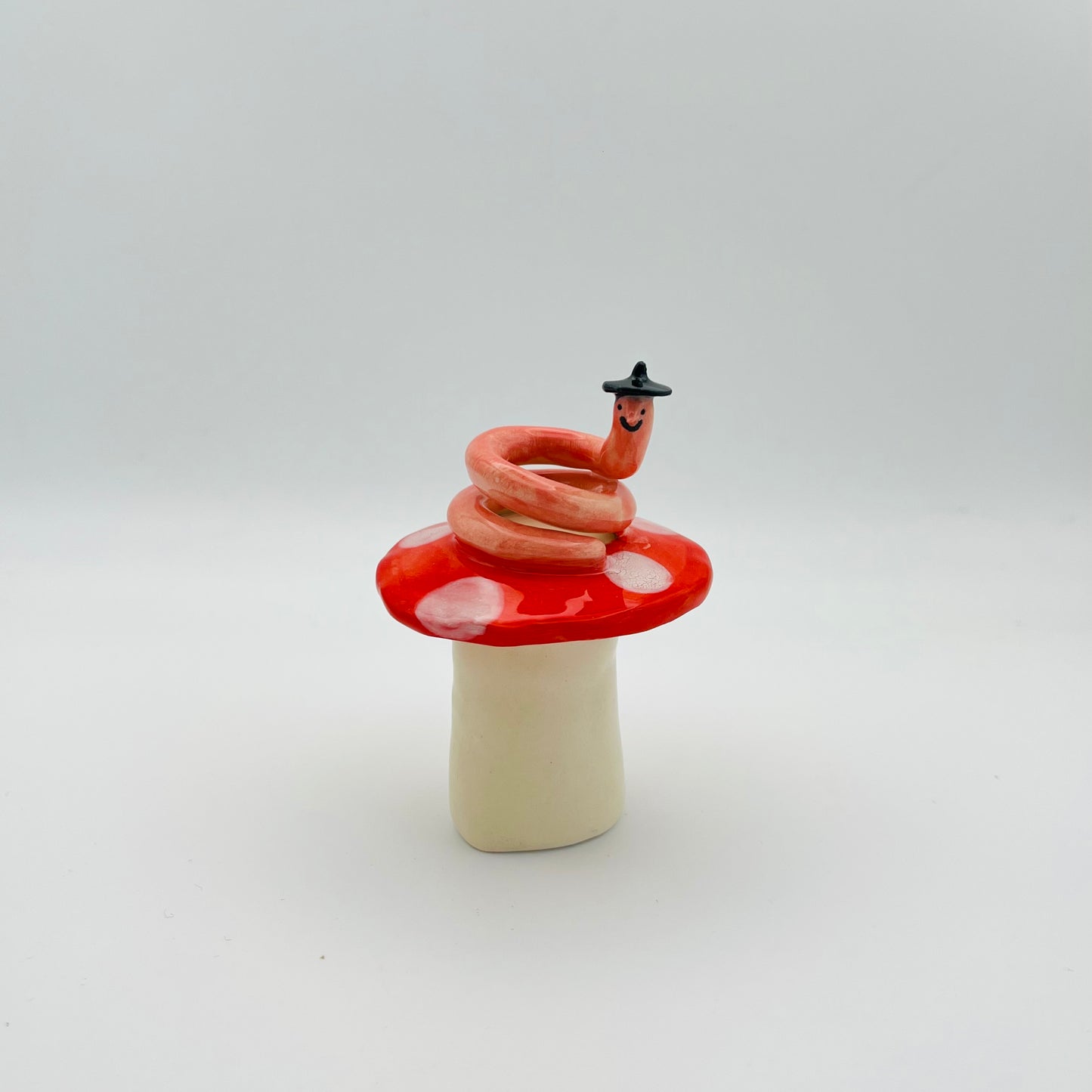 Beret worm ceramic ornament