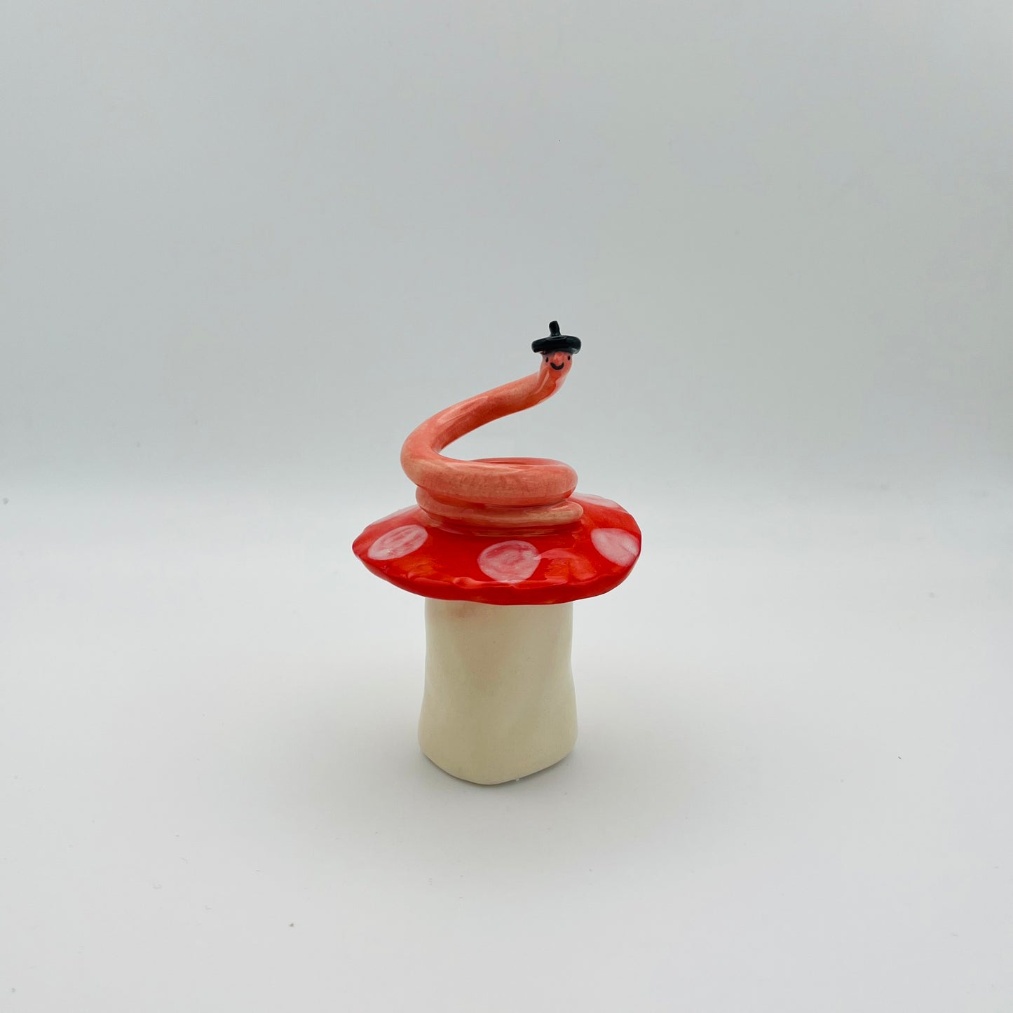 Beret worm ceramic ornament