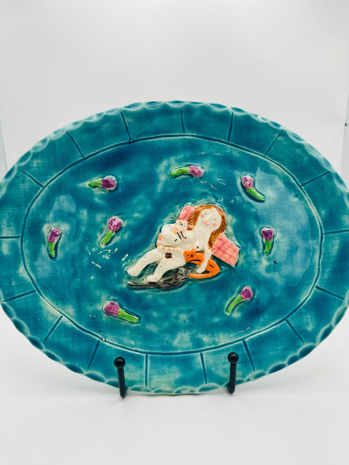 Lady reclining with cats and flowers plate