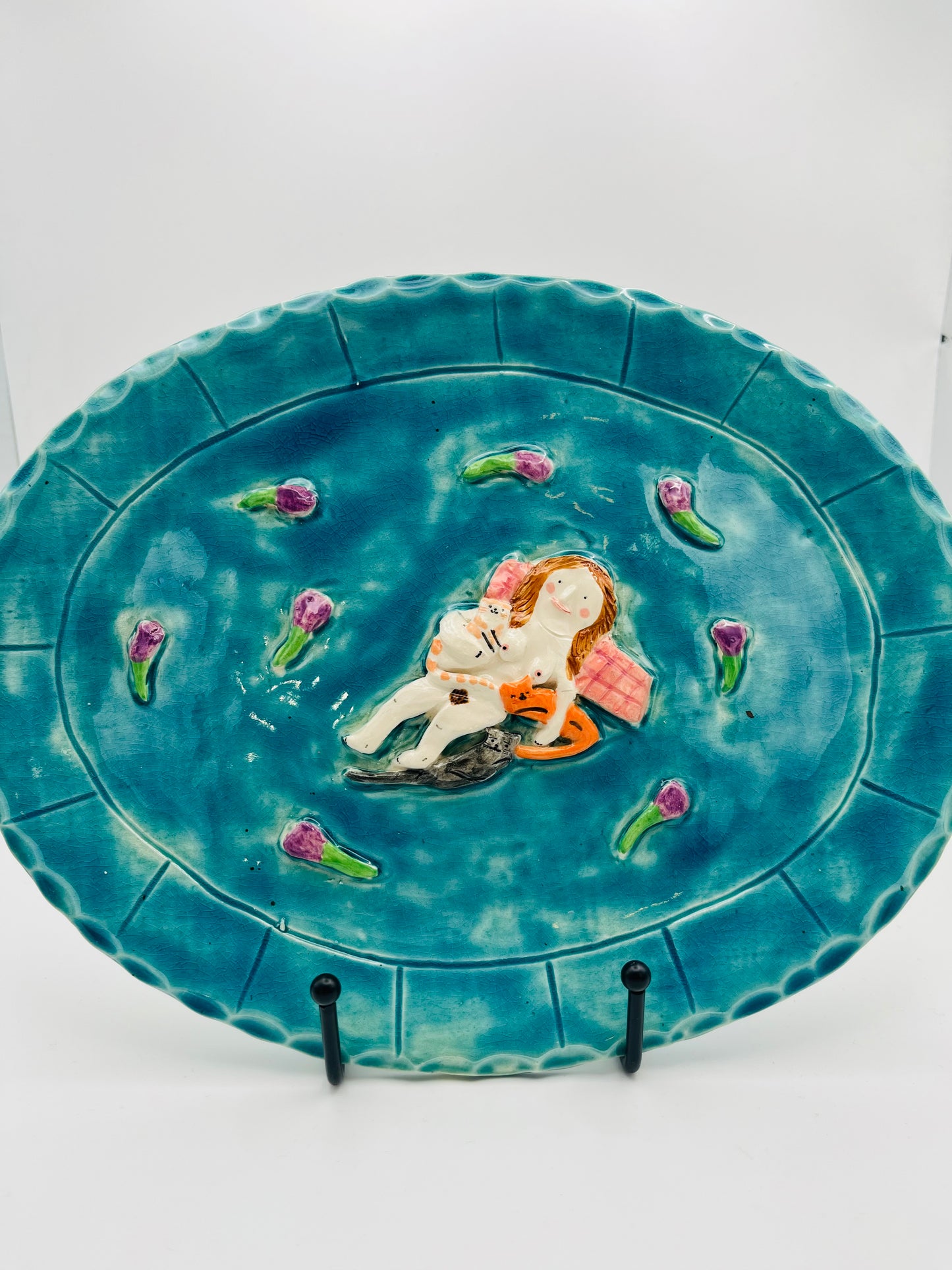 Lady reclining with cats and flowers plate