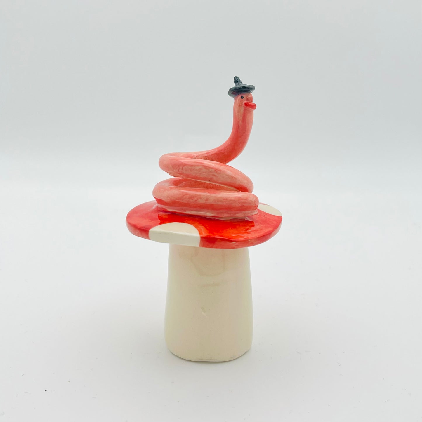 Beret worm ceramic ornament