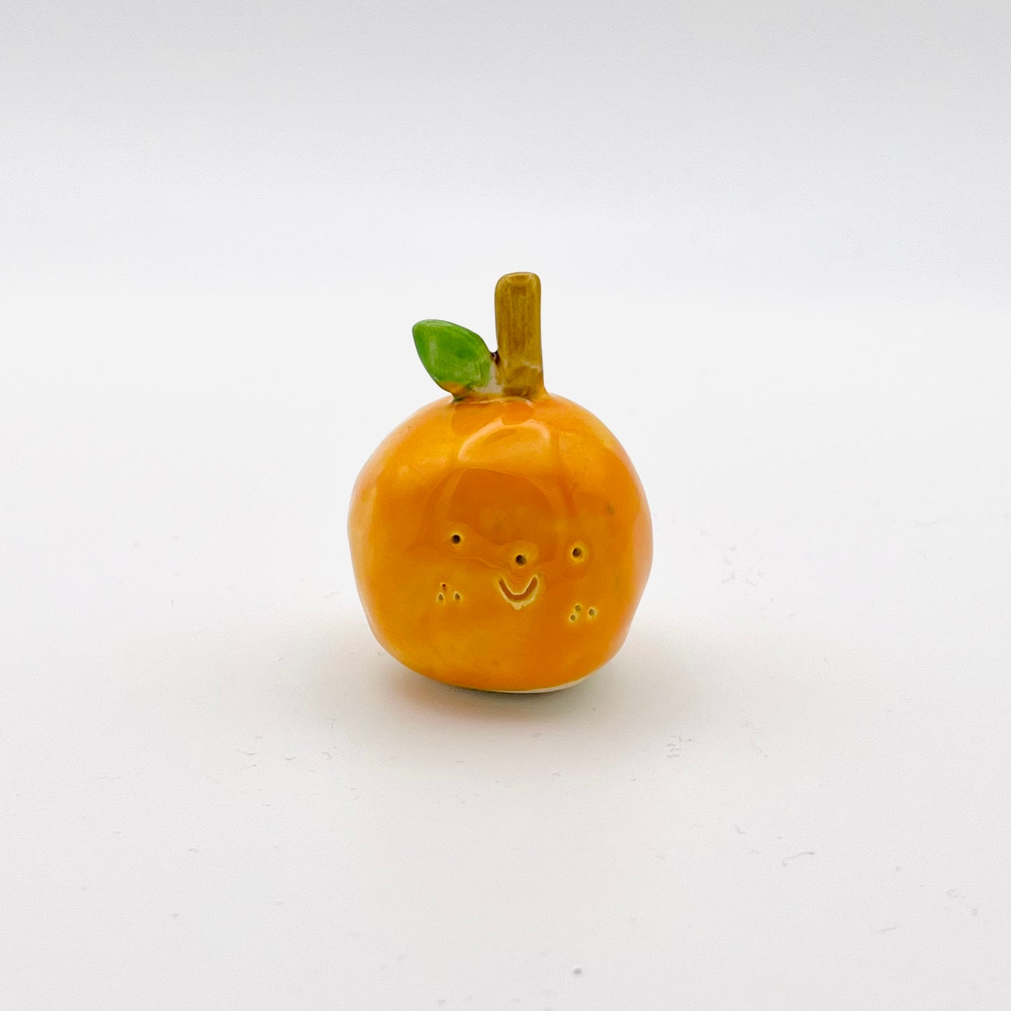 happy orange ornament