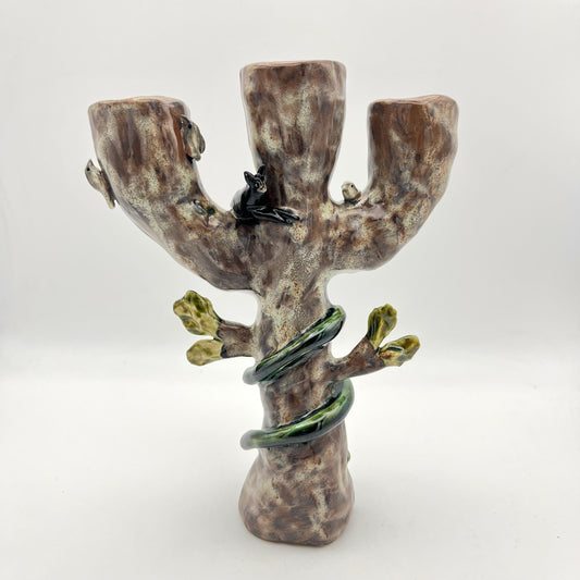 The cat, snake and bird candle holder